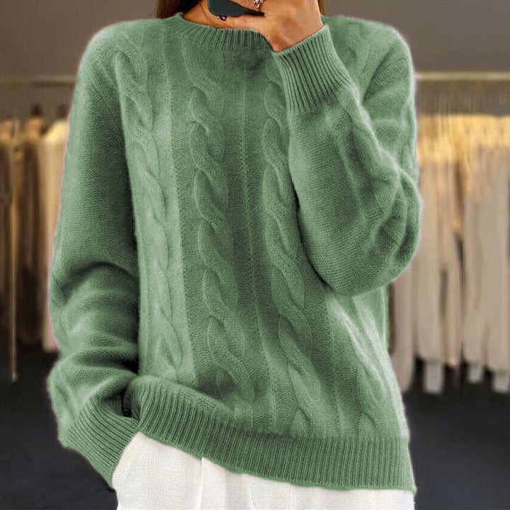 Maglione caldo lavorato a maglia in stile trecce