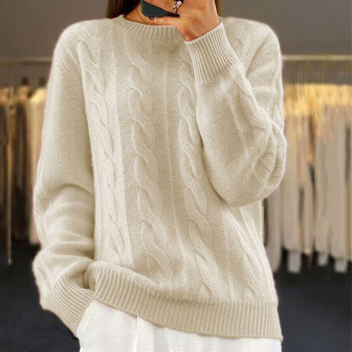 Maglione caldo lavorato a maglia in stile trecce