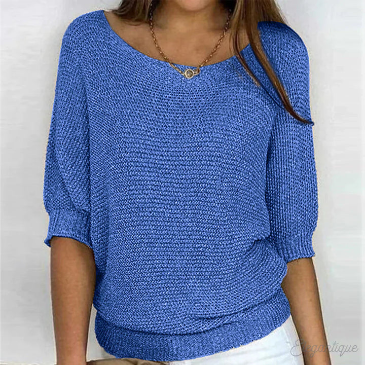 Elegante maglione lavorato a maglia a trecce