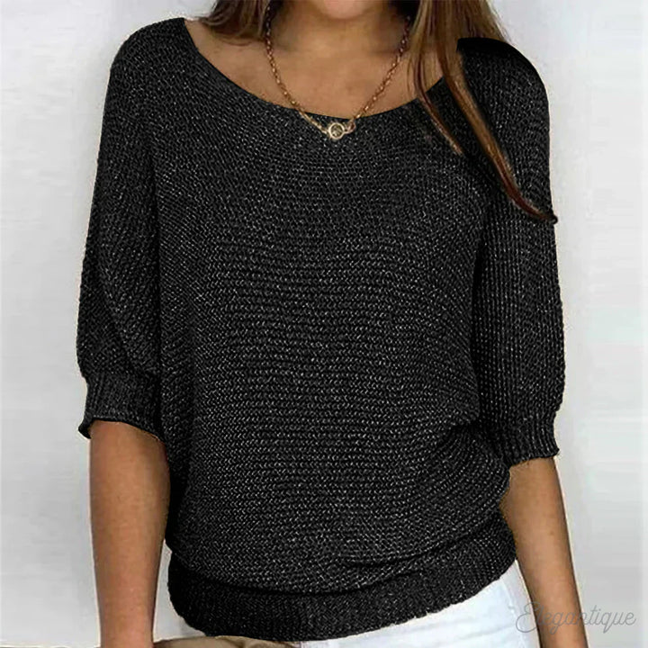 Elegante maglione lavorato a maglia a trecce