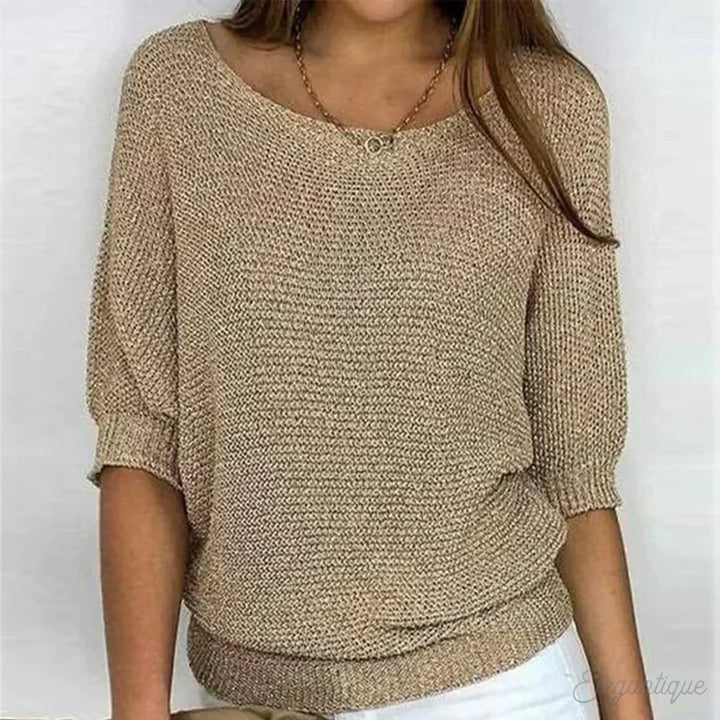 Elegante maglione lavorato a maglia a trecce